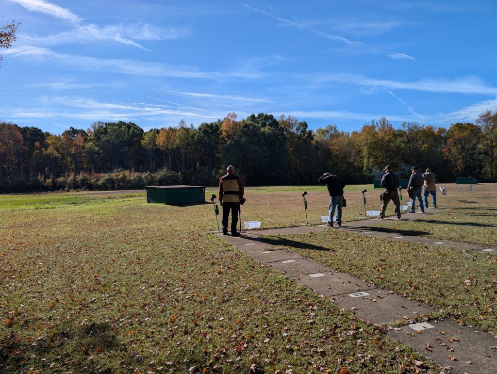Late fall squad shooting under a blue sky