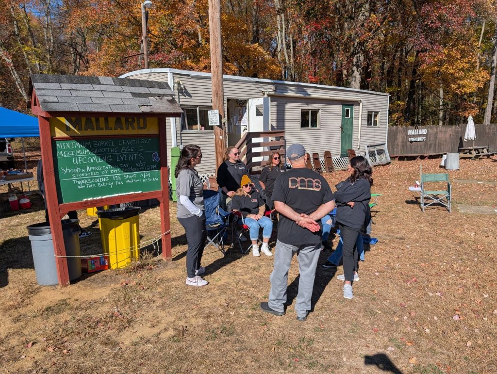 Members gathered by the clubhouse on Shooter Appreciation Day